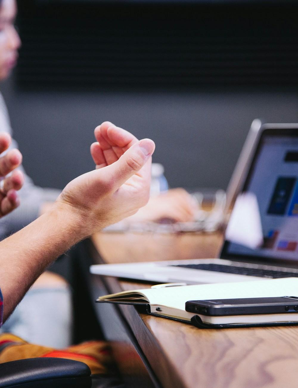 A working strategy discussion around the table — executive-led direction