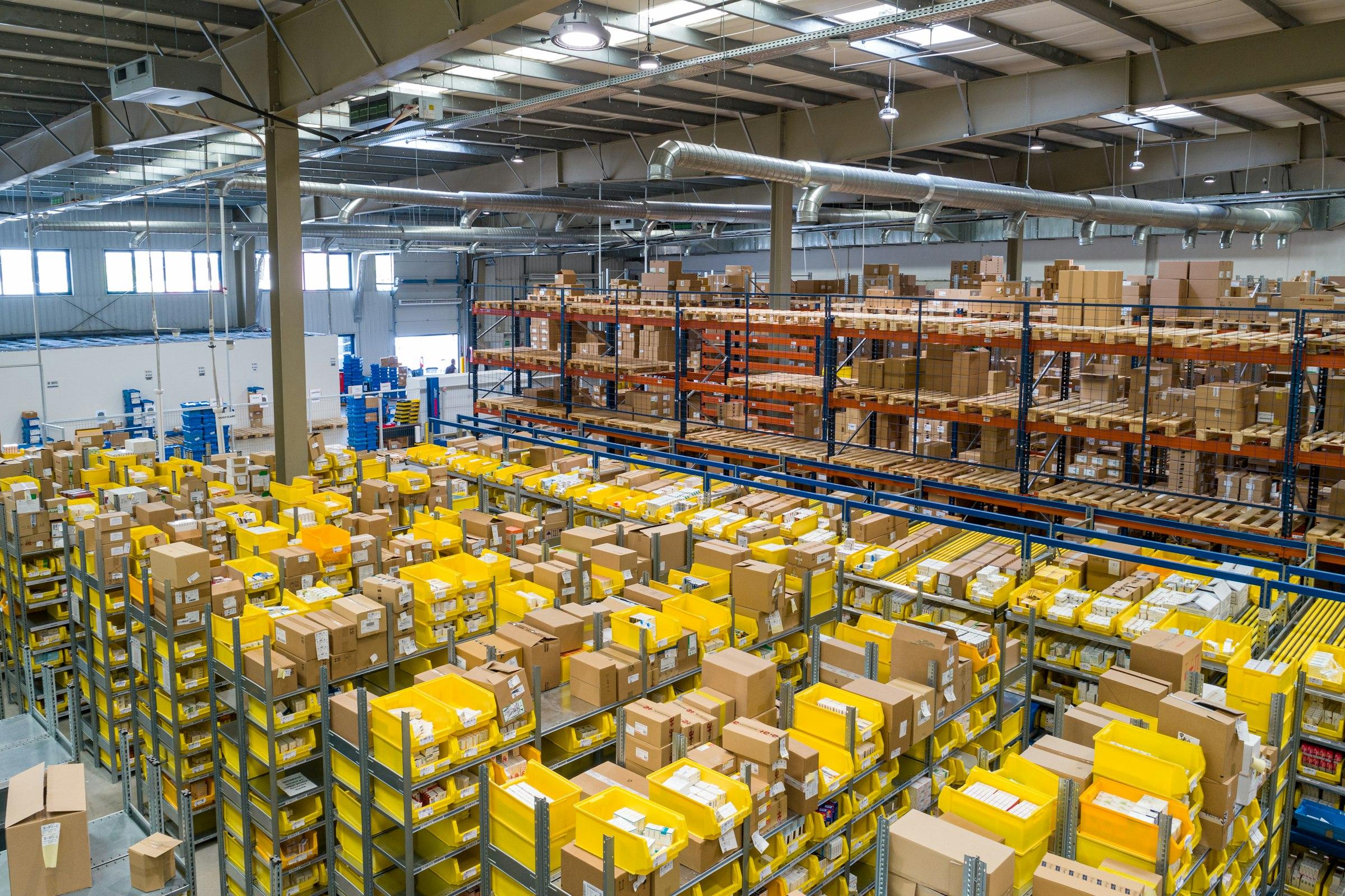 Warehouse aisles stretching out of sight